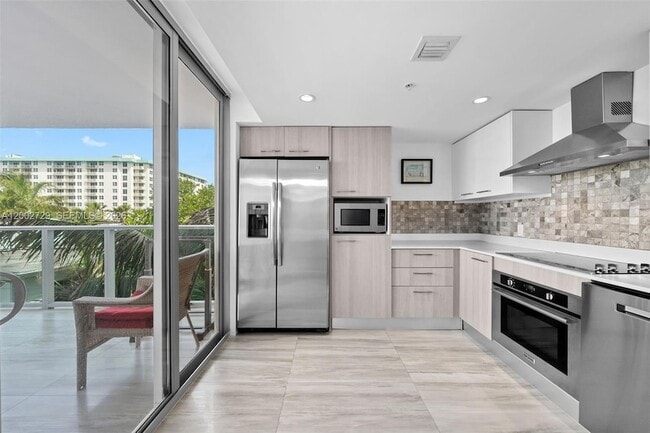 Building Photo - 1133 102nd St Unit 407