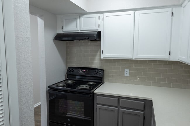 1BR/1.5BA KITCHEN - College Hill Flats