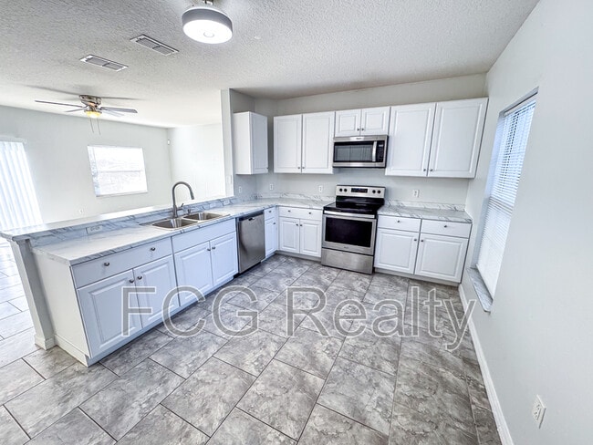 Photo - 702 Colville Pl