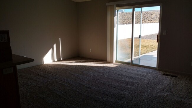 Photo - Spacious 4 Bedroom Home in Fernley with 3-Car Garage & Expansive Backyard