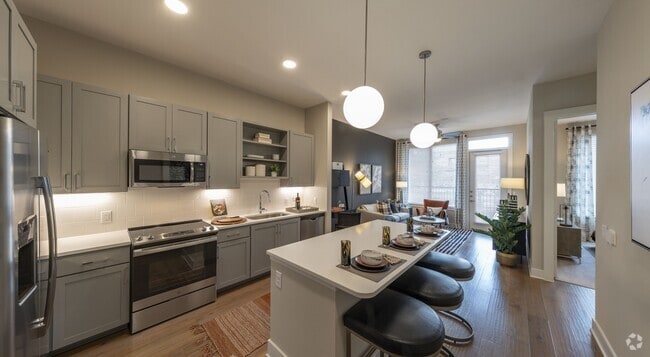 Building Photo - Free Rent for a Month – Yes, Really! Unit AATG1 Rental
