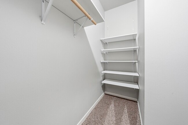 Elevate your living space at North Highlands Apartments with this spacious closet offering ample storage and organization options. Perfect for keeping your home tidy and stylish. Explore your future home today!