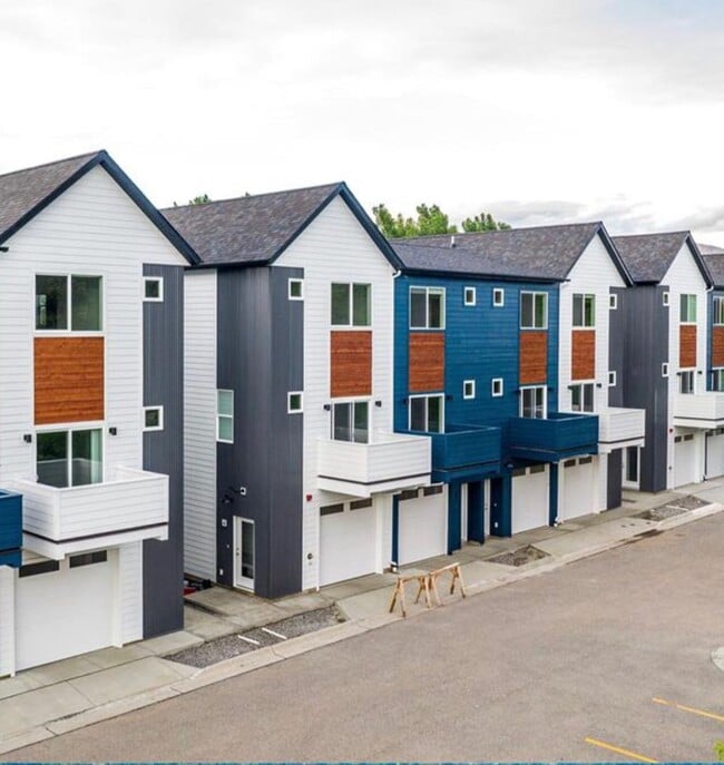 Building Photo - 3-Story Urban Walk Up at a Modern Communit...