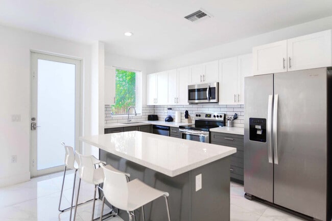 Photo - 1175 NW 26th St Unit FL1-ID1022299P