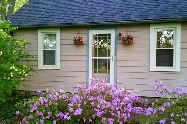 Vintage front door, double pane windows throughout the entire house and the roof has been replaced.