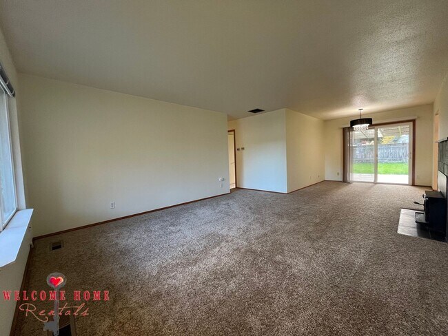 Photo - Beautiful Remodeled Rambler!!!  Come enjoy this HUGE backyard!!  NEW CARPET!!