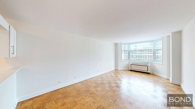 Building Photo - 400 E 71st St Unit 23K