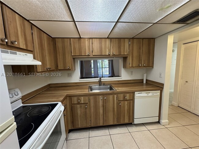 Building Photo - 10875 SW 112th St Unit 203