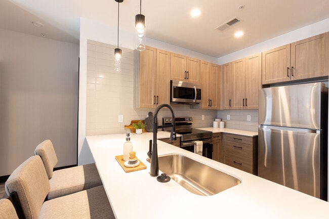 Kitchen with White Quartz Countertops