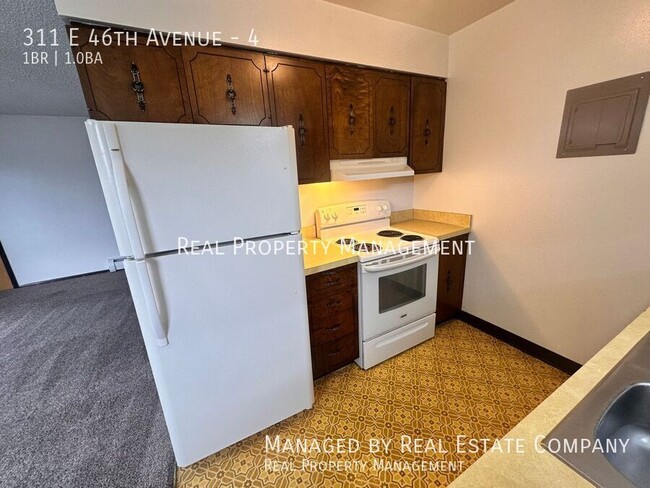 Photo - 311 E 46th Ave Apartment Unit 4
