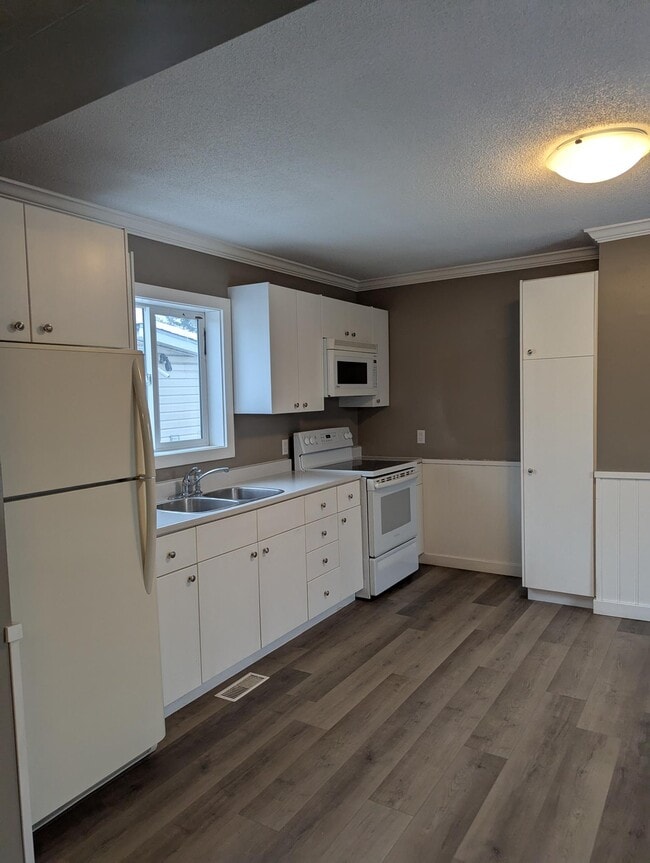 Photo - 1 Bedroom Main Floor Unit – $1,475/month +... Unit A (Main)