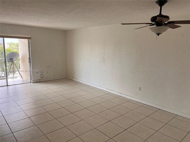 Building Photo - 7727 SW 86th St Unit A1-406 Rental