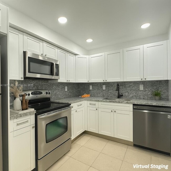 Building Photo - 7300 NW 17th St Unit 114