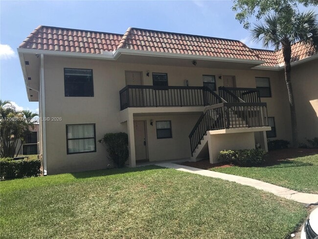 Building Photo - 6796 Palmetto Cir S Unit 101