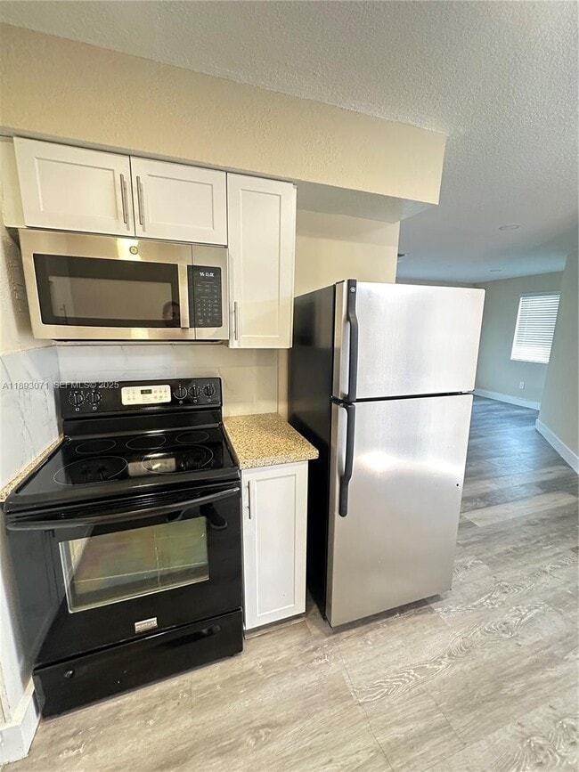 Photo - 97 NW 73rd Pl Unit 1-2