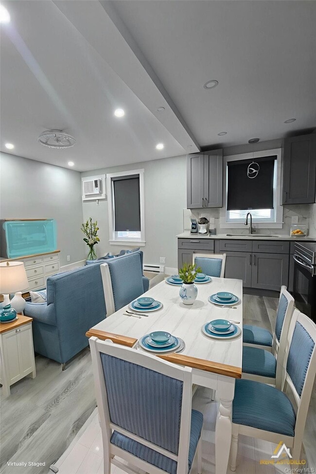 Building Photo - 59-34 Flushing Ave Unit 2