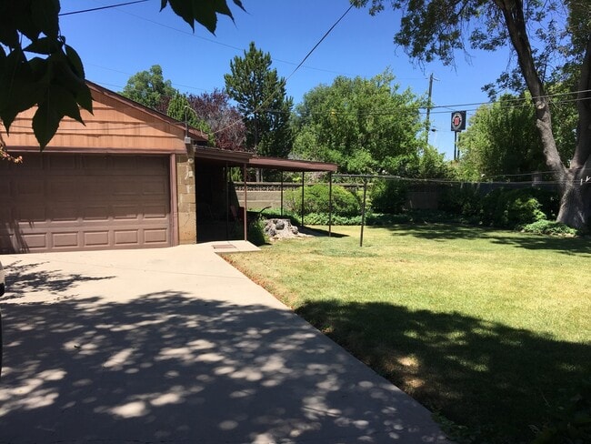 Photo - 4 bed - 2 bath Charming single family home walking distance to everything!