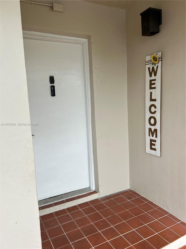Building Photo - 8879 Fontainebleau Blvd Unit 204