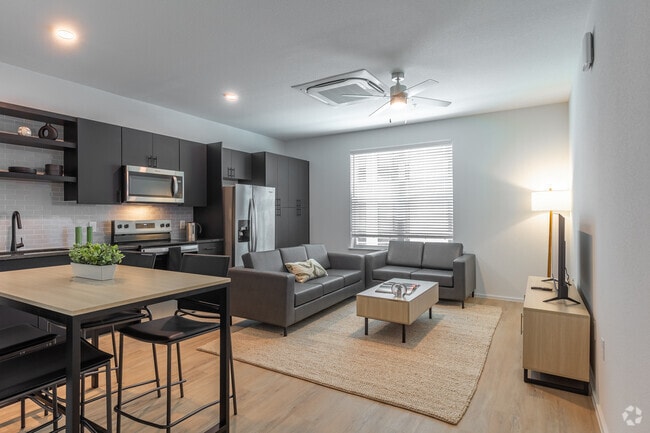 4BR, 4BA - 1,308SF - Living Room - UNITi Bishop Arts