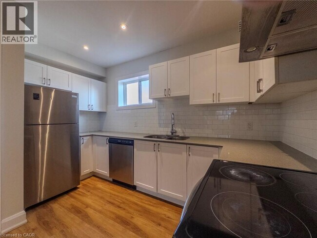 Photo - 540 King St E Unité C7