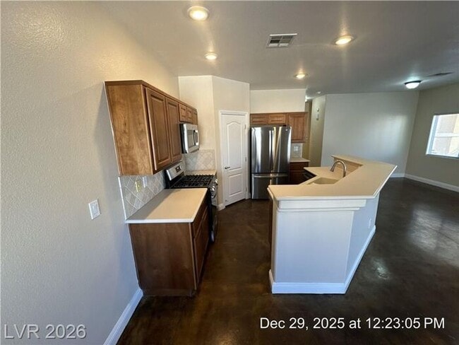 Photo - Cozy Gated Townhome with Private Yard, 2-Car Garage & Community Pool!