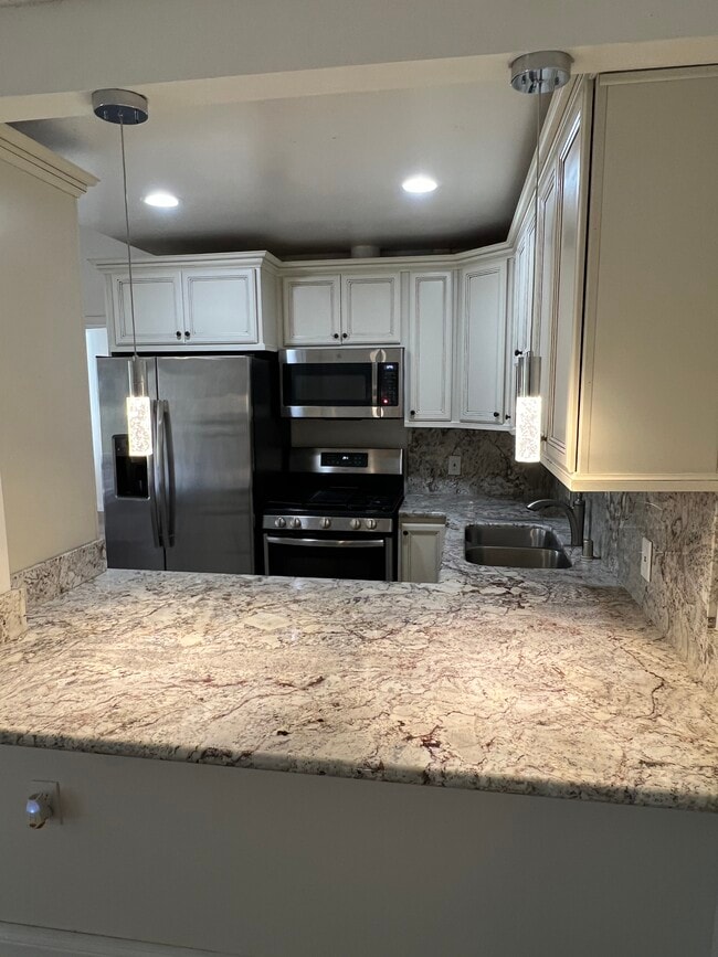 Stainless Refrigerator & Stove - 19156 Avenue of the Oaks Unit B