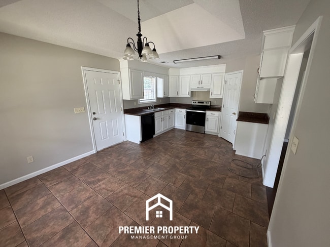 Photo - Charming 3BR/2BA Tuscaloosa Home | High Vaulted Ceilings, Hardwood Floors & Fenced Yard