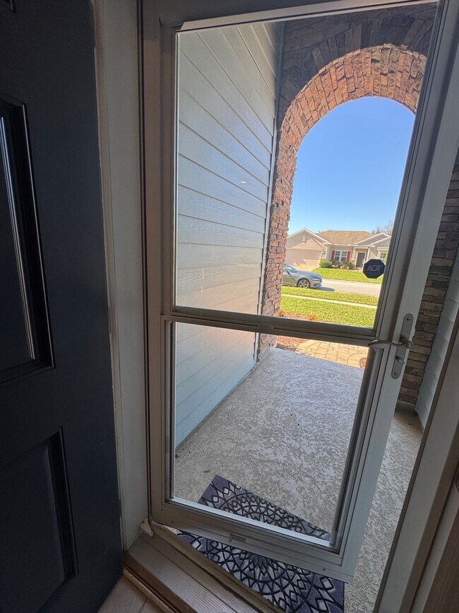 Photo - COMING SOON! Beautiful 4BR 3BA Home w/ Screened Lanai & Pond View • Garage Parking • Fenced Yard ...