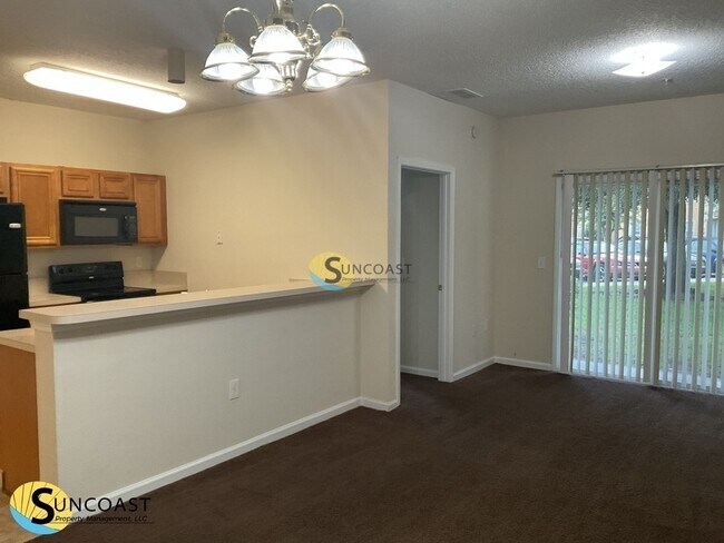 Photo - 6985 Ortega Woods Dr Unidad 3