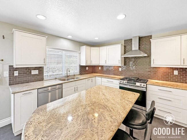 Photo - Beautiful 3-Bed Home w/ Vaulted Ceilings, Stainless Appliances, Private Backyard & 2-Car Garage