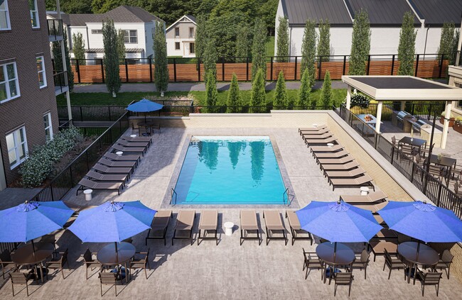 Aerial view of the pool and outdoor amenity spaces at Trail House in Norwood.