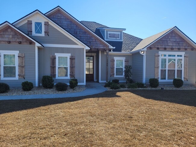 Building Photo - Spacious 4BR Home with Inground Pool, Open Split Floor Plan & Side-Entry Garage