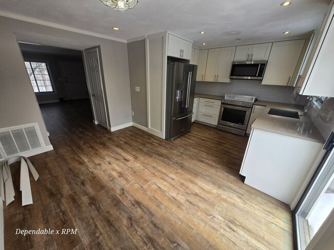 Photo - Stunning 2 Bd 2 Bath Townhouse in Wakefield w 2 parking spaces and 3 Levels of Living