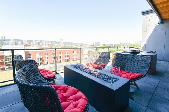 Rooftop terrace with cozy firepit and unobscured downtown Portland views - Windsor Buckman