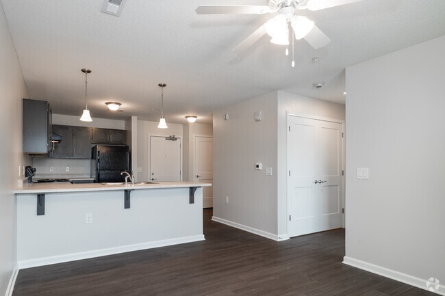 1BR, 1BA - 695SF - Dining Room/Living/Kitchen - Roberts Station 55+ Community