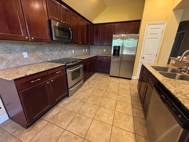 Photo - 4 BEDROOM WITH BONUS ROOM IN LEGACY SUBDIVISION