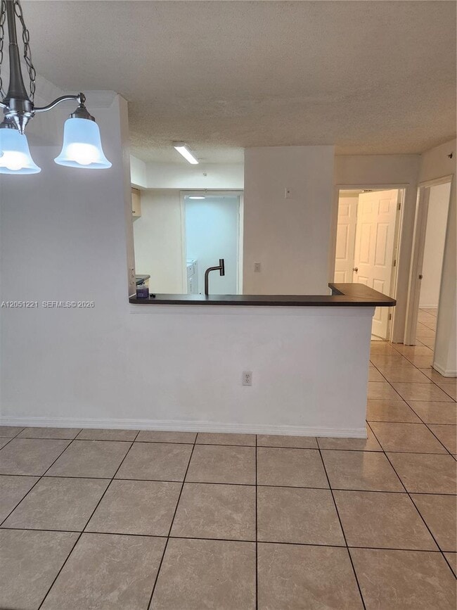 Building Photo - 2433 Centergate Dr Unit 203