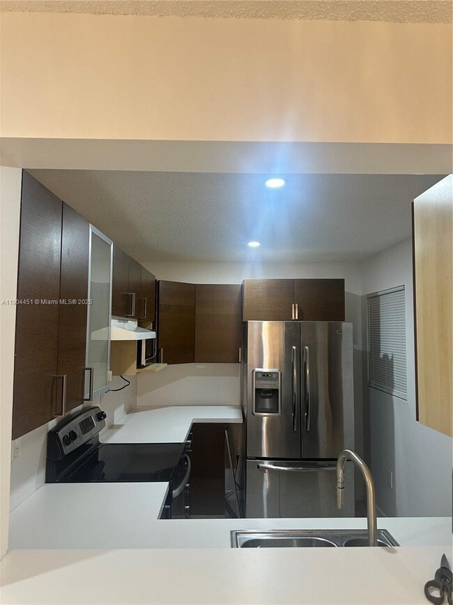 Building Photo - 1165 NW 125th Pl Unit 205