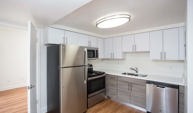Kitchen with quartz countertops and stainless steel appliances