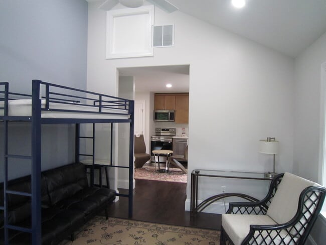 LR w/ Cathedral Ceiling & Ceiling Fan - 20527 Washington St Unit Garrage Carriage House