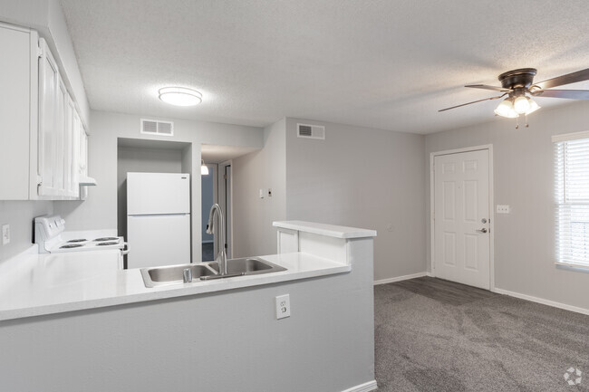 2BR, 1BA - 700SF - Living Room - Sun Ridge Village Apartments