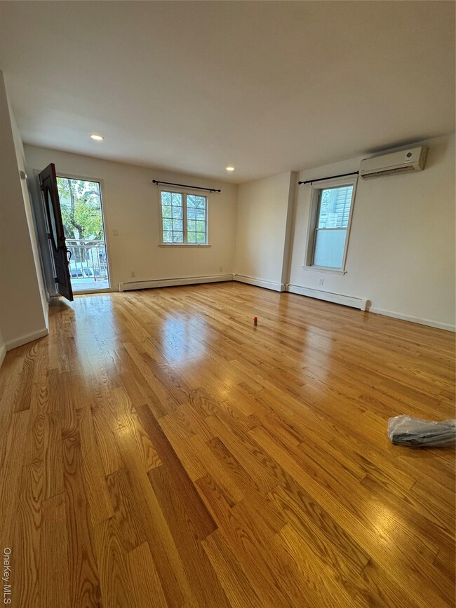 Building Photo - 9-14 College Point Blvd Unit Fl1