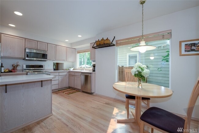 Photo - Elegant 3-Bedroom Home with Private Deck & Greenbelt Views!