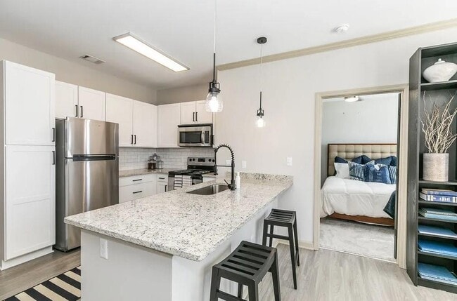 Building Photo - 1000 Ashwood Pkwy Unit 1239