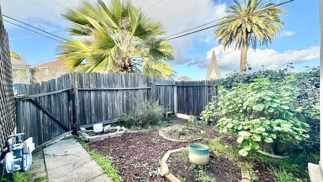 Photo - Sweet ground floor 1 Bedroom with a Sunny Wrap Around Deck and In-Unit Washer & Dryer Unit B