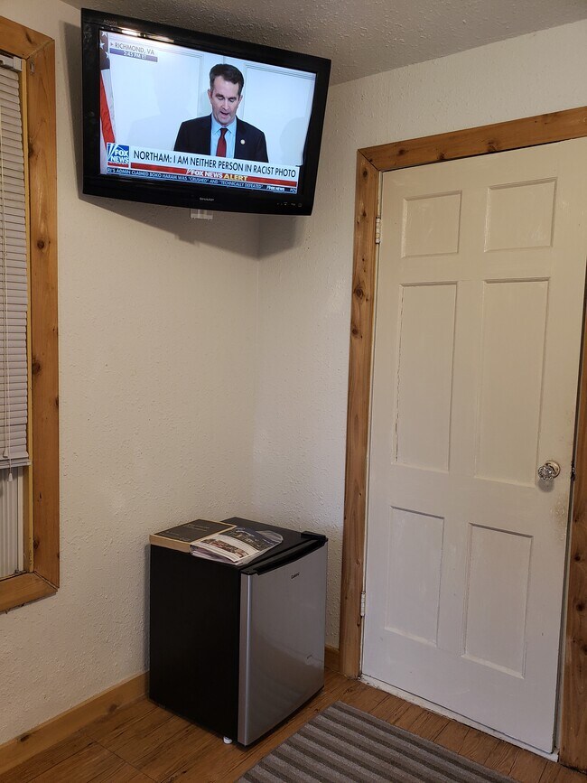 Small fridge, microwave, and tv included - 252 W Hermosa Dr Unit 1 studio apartment