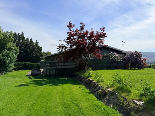 Photo - Country like setting! Spacious 3+ bed/ 1.5 bath house with garage, large yard, private deck and a...