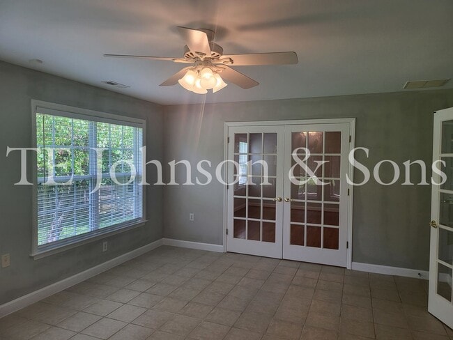 Photo - Charming 3BR Home with Bonus Room, Screened Deck & Two-Car Garage