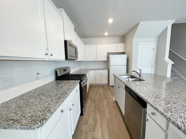 Photo - Spacious Four Bedroom Townhome w/ Garage! ...