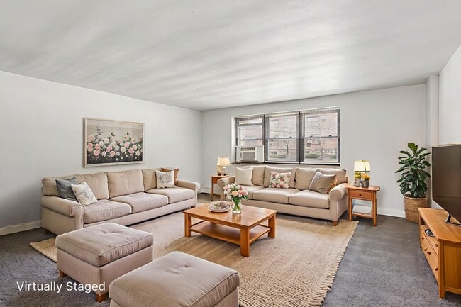 Área de estar - Tall Tree Village Apartments